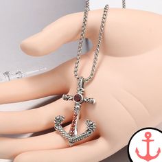 Anchor And Cross Necklace: The Perfect Symbol of Sea Love and Faith Are you a passionate lover of the sea? Do you find solace and inspiration in the symbols that represent this vast and magnificent body of water? Our Anchor And Cross Necklace is the perfect accessory for those who want to carry the essence of the sea and their faith with them wherever they go. As part of our Anchor Necklaces collection, this necklace is intricately designed with the nautical symbols of an anchor and a cross. The Nautical Style Metal Jewelry Gift, Symbolic Silver Anchor Jewelry, Stainless Steel Anchor Necklace For Gifts, Stainless Steel Anchor Necklace For Gift, Silver Anchor Shaped Metal Jewelry, Silver Anchor-shaped Jewelry In Metal, Nautical Symbols, Necklaces Collection, Love And Faith