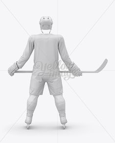 an ice hockey player in white uniform holding a stick