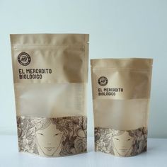 two bags of coffee sitting next to each other