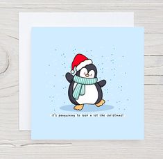 a penguin wearing a santa hat and scarf