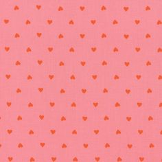 an orange and pink background with small red hearts on the left side of the image