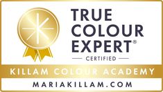 the true color expert certified logo with a gold ribbon around it's neck and an award