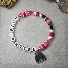 Matching Beaded Bracelets For Friends, Hazbin Hotel Clay Bead Bracelet, Fandom Bracelets, Matching Clay Bead Bracelets, Gothic Accessories Jewellery, Character Bracelets, Beaded Bracelet Ideas, Bracelet Clay