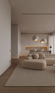 a modern living room with white couches and lamps on the wall above it's windows