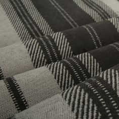 a close up view of a black and white checkered blanket