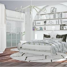 a bedroom with a bed, bookshelf and pictures on the wall