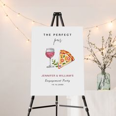 a sign with a pizza and wine glass on it