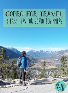 a woman standing on top of a mountain with the words gopro for travel and easy tips