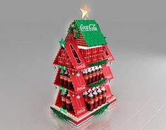 a christmas tree made out of coca - cola bottles is shown in this 3d image