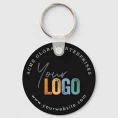 a round keychain with the words, your logo on it and an image of a