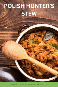 a wooden spoon in a bowl filled with stew