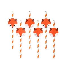 four orange and white striped straws with paper foxes on them in the shape of candy sticks