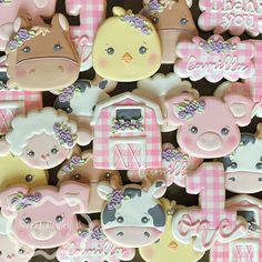 many decorated cookies with farm animals on them