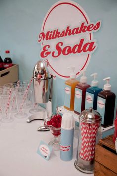 a table topped with lots of different types of soaps and lotions on top of it