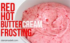 red hot buttercream frosting in a white bowl with the words, red hot buttercream frosting