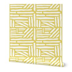 a yellow and white wallpaper with an abstract design on the front, featuring lines