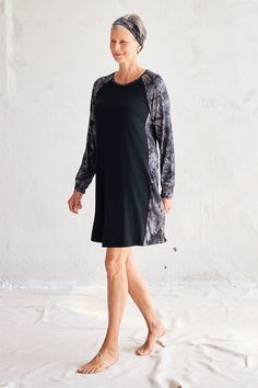 Laroe is 5'11" Comfortable Long Sleeve Sleep Dresses, Black Long Sleeve Sleepwear For Relaxation, Black Stretch Sleepwear For Relaxation, Stretch Black Sleepwear For Relaxation, Black Relaxed Fit Sleepwear, Black Relaxed Fit Dress For Loungewear, Black Relaxed Fit Sleepwear For Lounging, Casual Black Sleepwear For Overnight, Black Relaxed Fit Sleepwear For Night