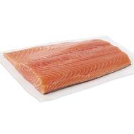 raw salmon fillet on a white background