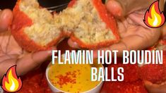 two hands holding pieces of food with flames in the background that says flaming hot boudiin balls