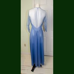 1950's Vanity Fair Violet Nightgown with Rhinestones. Size 34. Never been worn. Blue violet long nylon tricot nightgown with rhinestones. 3/4 rusched sleeves. Full A-line skirt.Excellent ConditionMeasurements - Bust 34 inches Waist 26.5 inches Hips 40 inches Length 54 inchesINTERESTED IN MORE THE ONE ITEM?If you are interested in buying more then one item. Please contact me and I will figure out the best way to ship. Since every item is unique it is difficult to set a standard shipping price.CON Vintage Fitted Nightgown For Party, Vintage Fitted Nightgown, Fitted Sheer Nightgown With Long Sleeves, Vintage Sheer Sleepwear For Evening, Fitted Long Sleeve Vintage Nightgown, Vintage Fitted Long Sleeve Nightgown, Vanity Fair Movie, 1950s Vanity, Women's Nightgowns