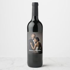 a bottle of wine with a photo on it