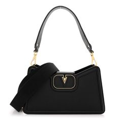 This is an authentic VALENTINO GARAVANI Grainy Calfskin VLogo Leather Shoulder Bag in Black. This shoulder bag is crafted of calfskin leather in black. It features a top handle, adjustable shoulder strap, and leather-covered Valentino Vlogo embellishment on the front flap. This bag opens to a smooth nappa leather interior. Evening Bag With Saffiano Leather And Leather Lining, Evening Bags With Saffiano Leather And Leather Lining, Luxury Calf Leather Evening Shoulder Bag, Luxury Calf Leather Shoulder Bag For Evening, Luxury Evening Bags In Textured Leather, Evening Saffiano Leather Bag, Designer Saffiano Leather Shoulder Bag With Soft Leather, Evening Bag With Textured Calf Leather, Evening Saffiano Leather Shoulder Bag With Removable Pouch