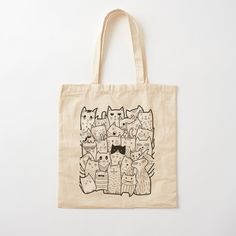 a tote bag with cats drawn on it