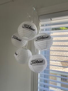 White Chinese lanterns with Titleist logo that look like golf balls Paper Lantern Golf Ball, White Chinese Lanterns, Golf Themed Party, Golf Baby, Golf Diy, Wedding Party Planning, Golf Party, Chinese Lantern