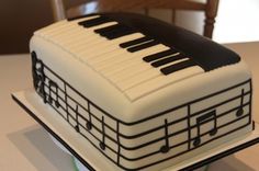 a sheet cake with musical notes on it