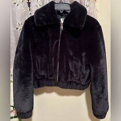 Excellent Condition, Never Worn! Black Outerwear With Faux Fur Trim For Fall, Trendy Black Outerwear With Faux Fur Lining, Black Cropped Jacket For Cold Winter Weather, Casual Black Fur Coat For Cold Weather, Casual Black Fur Coat With Faux Fur Lining, Casual Black Faux Fur Coat, Casual Black Faux Fur Outerwear, Black Long Sleeve Fur Coat With Zipper, Faux Fur Jacket