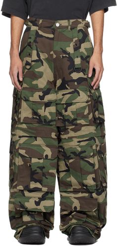 Wide-leg cotton twill cargo pants. Camouflage pattern printed throughout. · Paneled construction · Belt loops · Cinch straps at waistband · Four-pocket styling · Zip-fly · D-ring straps at front and back · Cargo pockets at front and outseams · Logo-engraved silver-tone hardware Supplier color: Camo Vetements Pants, Camo Cargo Pants, Green Power, Power Ranger, Camo Pants, Silver Engraving, D Ring, Luxury Streetwear, Cargo Pants