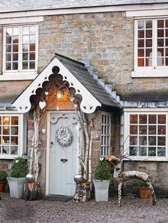 a house that has some plants in front of it