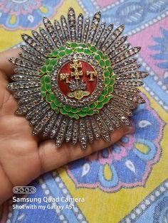 Handmade item Recycling: No Brooch Length: 3.50 Inches Gemstone: Rose Cut diamond & Emerald Brooch weight: 45.700 Grams Enamel:Red & Green Diamond weight: 21.40 carats Diamond colure: Light Tinted Brown Diamond shape: Round Emerald weight: 0.30 carats Material: Silver Sterling silver Purity: 925 Brooch Finished: Antique & Gold Traditional Hallmarked Brooch For Formal Occasions, Ornate Pendant Brooch For Ceremonial Occasions, Traditional Pendant Brooches For Formal Occasions, Traditional Gemstone Brooches For Gift, Traditional Gemstone Brooches As Gift, Ceremonial Hallmarked Pendant Brooch, Handmade Traditional Brooch For Formal Occasions, Traditional Handmade Brooch For Formal Occasions, Traditional Pendant Brooches As Gifts