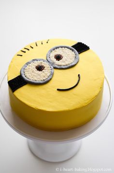 a yellow cake with two eyes on it