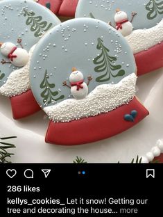 decorated cookies with snowmen and trees on them