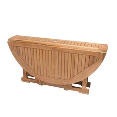 a wooden bench sitting on top of a white floor next to a planter box