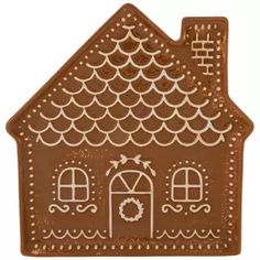 a cookie shaped like a house with a wreath on the roof