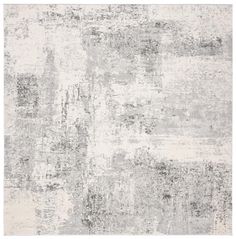 an abstract rug with grey and white colors