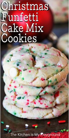 christmas funfetti cake mix cookies are stacked on top of each other with sprinkles