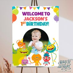 a birthday card with an image of a baby in front of balloons, monsters and the words welcome to jackson's 1st birthday