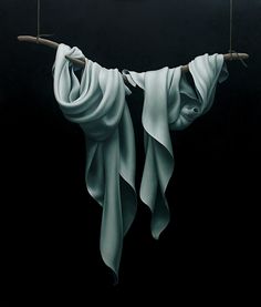 there is a cloth hanging on a clothes line with two strings attached to it,