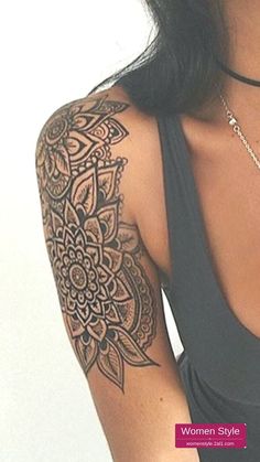 a woman with a tattoo on her arm