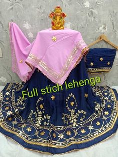 "Thank you very much for visiting my shop. Material-Pure Chinon Lehenga with Heavy Aari work Real Gota Patti work Dupatta - Georgette Dupatta with Gota Patti Work Accompanied with unstitched blouse piece Blouse- chion fabric  Blouse - Running Blouse Blouse length: 0.80 mtrs Waist Size : 42 Lenght  40 We are having expert staff in stitching .We are also take orders for dance performance, stage performance, marriage party, theme dresses, and any other demand etc.    Easy to wear and very comfortable It Gracefully Add Style To Your Attire & Match With Your Confidence Disclaimer: Colors may slightly vary due to Photographic effects IMPORTANT NOTE : Please Be aware that Similar Looking Products of LOW QUALITY are Being Sold at Lower Price By Other Sellers, So Make Sure that You Order Genuine Pr Festival Georgette Lehenga With Gota Work, Festive Lehenga With Gota Work In Georgette, Festival Lehenga With Gota Work In Georgette, Georgette Lehenga With Dabka Work For Festivals, Chanderi Lehenga With Dabka Work For Navratri, Festival Georgette Choli With Dabka Work, Festival Georgette Choli With Gota Work, Choli With Gota Work In Chinon For Festivals, Chinon Choli With Gota Work For Festivals