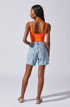 U-bar sleeveless bodysuit Snap closure Partially lined (bust only) Self: 75% Nylon, 25% Elastane / Lining: 95% Polyester, 5% Elastane Hand wash cold, do not bleach Line dry, iron low if needed Do not tumble dry Style #AT18444 High Cut Nylon Bodysuit For Summer, Trendy Nylon Bodysuit, Nylon Summer Bodysuit, Sleeveless Nylon Bodysuit, Nylon Bodysuit For Summer, Summer Nylon Bodysuit, Fitted High Rise Tank Top For Summer, Chic Nylon Sleeveless Tank Top, Fitted High Rise Bodysuit For Summer