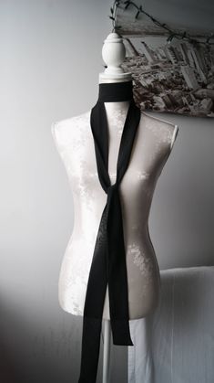 Long chiffon skinny neck tie. This multifunctional day to night piece is a must have for every closet. You can wear it in many ways. Wear it loosely for layered look or knotted as a chic choker. Must have for every fashionista! Size Length 225cm | 88,5 in Width 5cm | 2 in Handmade item. Wonderful gift for women or female friends. Feel free to contact me if you have any questions ;) Elegant Standard Tie For Office, Elegant Black Suit And Tie Accessories For Office, Elegant Adjustable Neckwear, Elegant Solid Color Adjustable Neckwear, Elegant Adjustable Solid Neckwear, Elegant Standard Tie For Black Tie Occasions, Elegant Evening Standard Tie, Black Neckwear With Ties For Parties, Elegant Black Suit And Tie Accessories For Evening