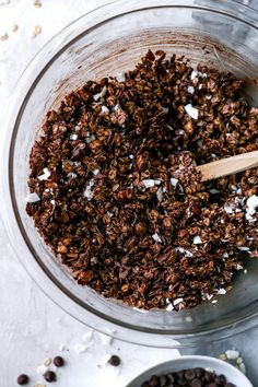 a bowl filled with granola and chocolate chips