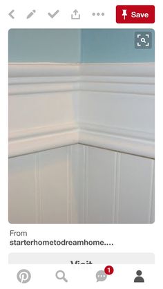 the corner of a room with white paint on it