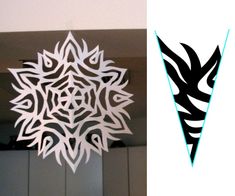 a paper snowflake is shown next to an image of a black and white ornament