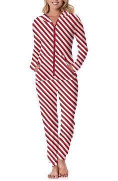 A tag-free design adds to the superior comfort of these jumpsuit-style pajamas crafted from soft, breathable jersey in festive candy-cane stripes. The smooth, stretchy style is complete with sun-protection properties and handy pockets. 53" length; 57" inseam; 9" leg opening (size Medium) Front zip closure Fixed hood Long sleeves Split kangaroo pocket UPF 50+ sun protection Lined 95% viscose, 5% spandex Machine wash, tumble dry Imported Jumpsuit Style, Candy Cane Stripes, Kickee Pants, Jumpsuit Fashion, Sleepwear Women, Upf 50, Candy Cane, Kangaroo Pocket, Sun Protection