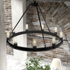 The simple design of the Saddlewood round chandelier makes it the perfect finishing touch in modern industrial and farmhouse spaces. Tailor the look of this modern farmhouse chandelier based on the light bulb style you choose. With 8 lights, this round chandelier gives off ample light where you need it. Hunter Saddlewood 9-Light Matte Black Transitional Led Chandelier | 19030 Cabin Chandelier, Circle Chandelier, Modern Farmhouse Chandelier, Nook Table, Hunter Ceiling Fans, Outdoor Chandelier, Hunter Fan, Hardwood Tile, Farmhouse Chandelier